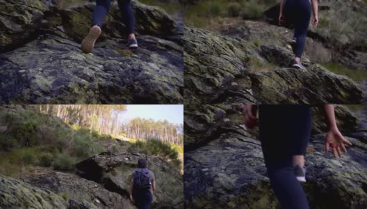 女人女孩徒步旅行在自然景观攀登岩石蒙迪姆德巴斯托与脚鞋的细节，葡萄牙高清在线视频素材下载
