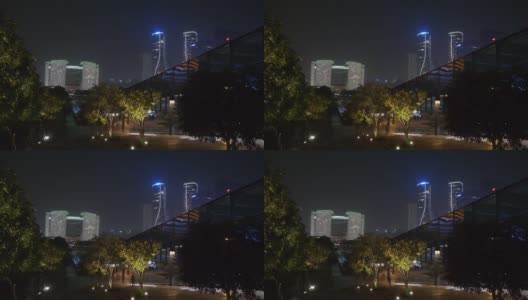 杭州市区夜景时间照亮了著名的现代建筑，广场顶全景4k中国高清在线视频素材下载