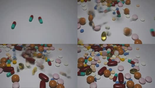 五颜六色的药丸、药片和胶囊落在工作台上高清在线视频素材下载