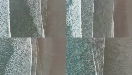 飞过海浪冲击海滩高清在线视频素材下载