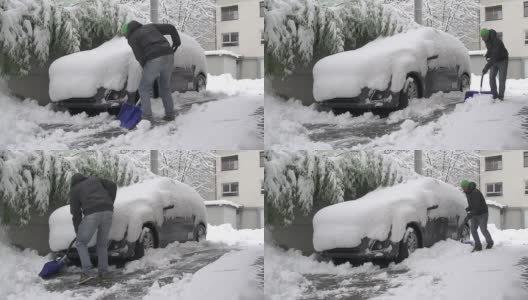 在汽车前铲雪的男人高清在线视频素材下载