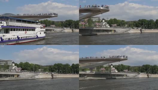 在莫斯科河莫斯科河堤上的扎里亚耶公园的浮桥，俄罗斯莫斯科。从旅游游船上拍摄高清在线视频素材下载