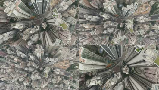 无人机俯瞰香港城市景观。从无人机拍摄的香港城市90度鸟瞰图。摄像机从下到上的旋转。高清在线视频素材下载