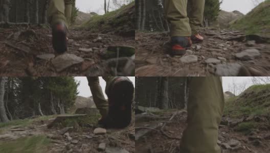 一个徒步旅行者的靴子特写，小心翼翼地走着高清在线视频素材下载