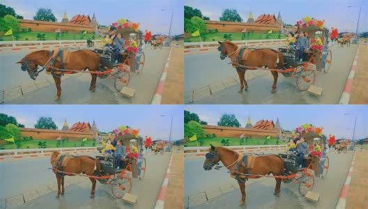 在泰国南邦，一家人正在享受一辆马车高清在线视频素材下载