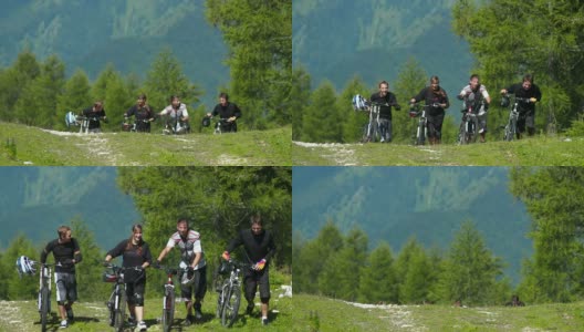 HD:山地自行车手推着自行车上坡高清在线视频素材下载