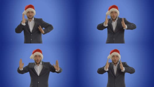 戴着圣诞老人帽子的年轻商人高清在线视频素材下载