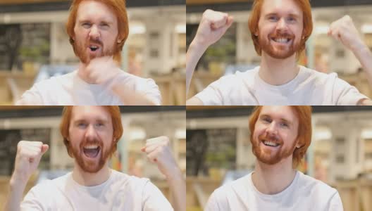 快乐红发胡子男子庆祝成功的肖像高清在线视频素材下载