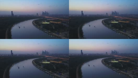 俄罗斯日落之夜莫斯科城著名的麻雀山城市景观空中全景4k高清在线视频素材下载