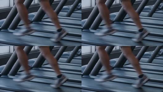 在健身房跑步机上跑步的亚洲人高清在线视频素材下载