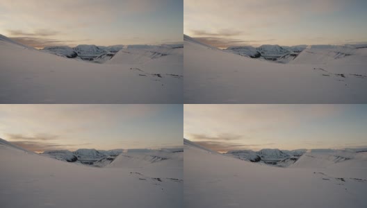从斯瓦尔巴群岛的朗伊尔布林冰川俯瞰朗伊尔城高清在线视频素材下载