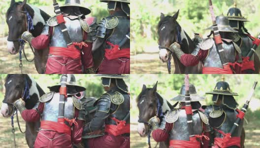 身穿古代盔甲的泰国士兵骑着马高清在线视频素材下载