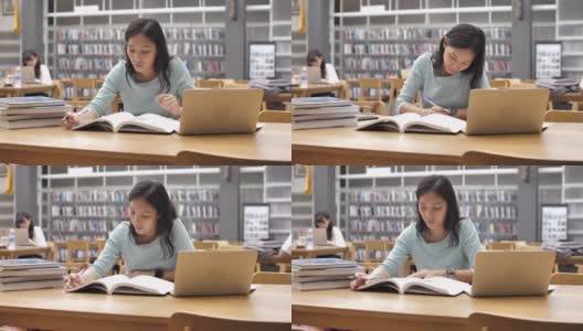 亚洲女人在图书馆看书高清在线视频素材下载