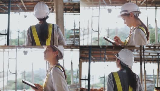 女工程师在施工现场使用数字板进行结构检查高清在线视频素材下载