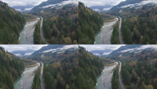 鸟瞰秋天的森林和河流在加拿大山谷与低云高清在线视频素材下载
