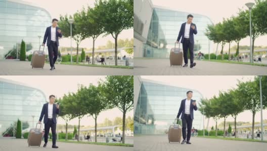 亚洲旅游商人带着行李箱从航站楼走过，背景是一个现代化的城市高清在线视频素材下载