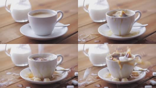 咖啡和糖洒在桌上的杯子里高清在线视频素材下载