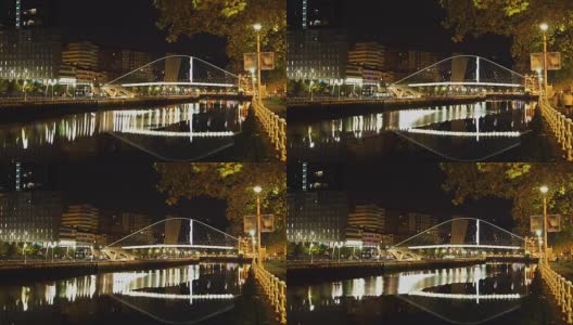 西班牙毕尔巴鄂横跨Nervion河的拱桥夜景高清在线视频素材下载