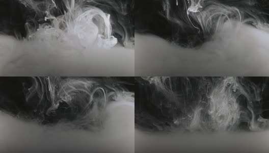 概念艺术:水中的白色油漆，慢动作中的烟雾高清在线视频素材下载