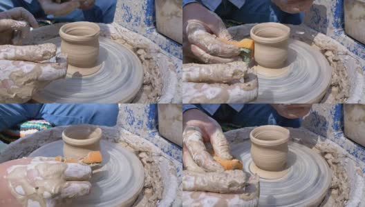 陶工大师的双手和陶工轮上的粘土花瓶高清在线视频素材下载