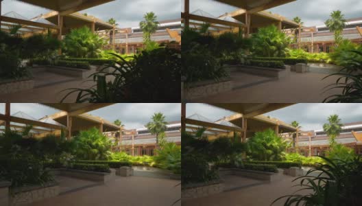 阳光明媚的一天三亚著名机场花园慢镜头全景4k中国海南高清在线视频素材下载