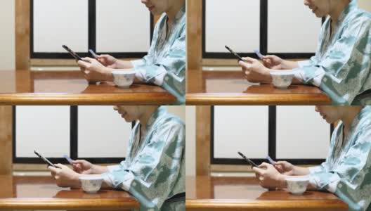 日本女人用手机购物高清在线视频素材下载