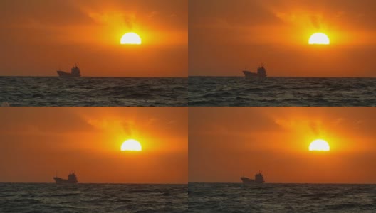 日落时分，海上的货船高清在线视频素材下载