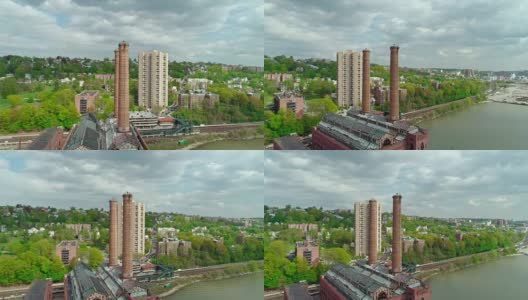 纽约中央铁路废弃工厂的鸟瞰图-电厂在扬克斯的哈德逊河。高清在线视频素材下载