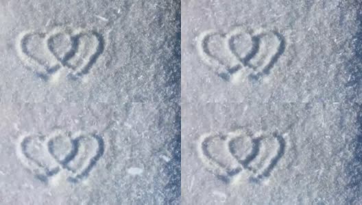 雪上的两个心符号高清在线视频素材下载