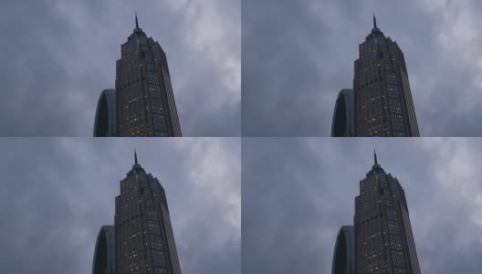 风暴天空广州市区摩天大楼向上看4k中国全景高清在线视频素材下载