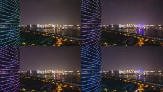 夜光照耀海南岛三亚湾公寓综合楼全景4k时间推移中国高清在线视频素材下载