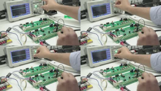 手动电子焊接和示波器测试高清在线视频素材下载