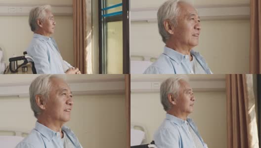 坐在窗边轮椅上的亚裔老人高清在线视频素材下载