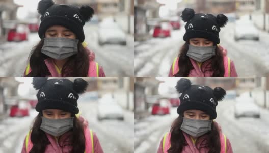 戴着防护面具的女孩在城市里高清在线视频素材下载