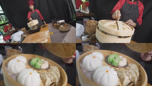亚洲女人包饺子、饺子是中国传统食物的概念。高清在线视频素材下载