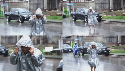 下雨天穿雨衣的女人慢镜头高清在线视频素材下载