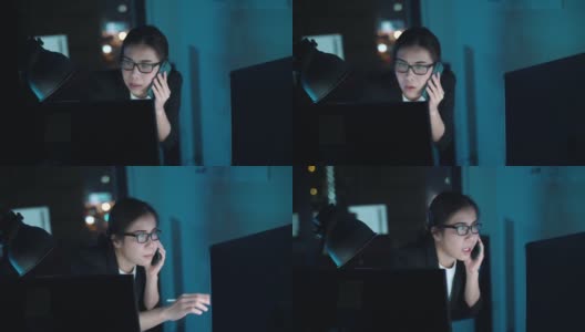 亚洲商业女性工作到深夜，有电话高清在线视频素材下载