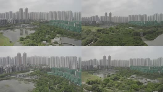 中国香港天水围湿地公园上方的高层公寓高清在线视频素材下载