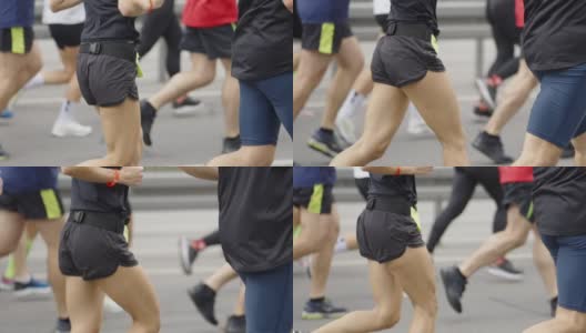 马拉松选手在城市的街道上高清在线视频素材下载