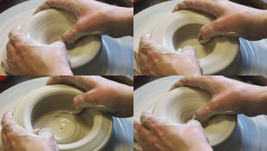用手指在陶工轮上膨胀粘土坯的内径高清在线视频素材下载
