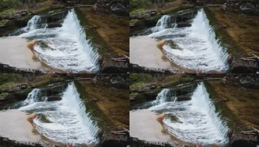 从山上河流上看到的小森林瀑布高清在线视频素材下载