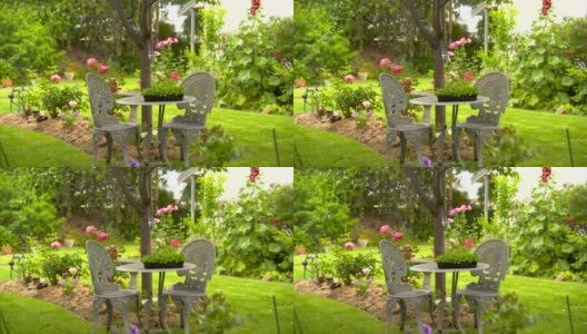 户外桌椅在一个美丽的后院花园公园高清在线视频素材下载