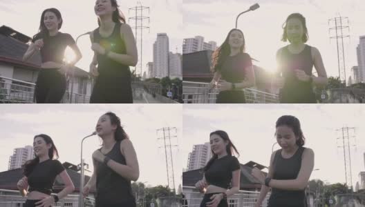 亚洲女性朋友在城里慢跑高清在线视频素材下载