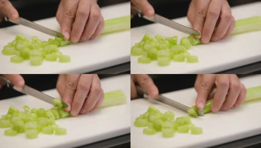 慢动作近手用刀将芹菜切在厨房的砧板上高清在线视频素材下载