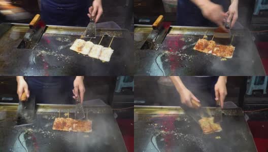 传统的烧烤小吃烹饪在中国西安高清在线视频素材下载