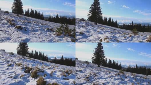 个人视角在雪山远足，徒步者行走。雪的冬天的风景。高清在线视频素材下载