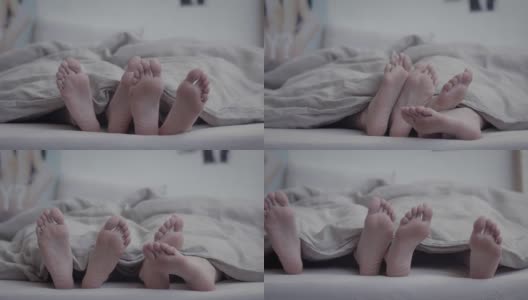 睡在一起的年轻情侣的脚高清在线视频素材下载