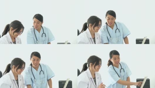 两位医生在电脑前高清在线视频素材下载