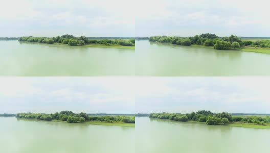 空中——宽阔的河流和绿色的田野。俄罗斯和欧洲的性质。高清在线视频素材下载