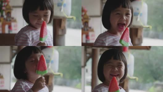 小女孩(2-3岁)在吃巧克力冰淇淋高清在线视频素材下载